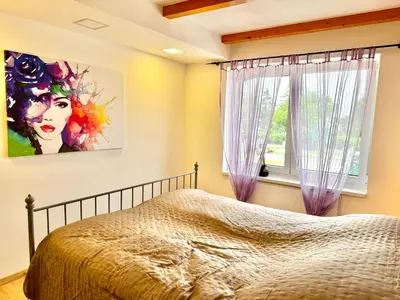 Ein Bett oder Betten in einem Zimmer der Unterkunft Stork Apartment