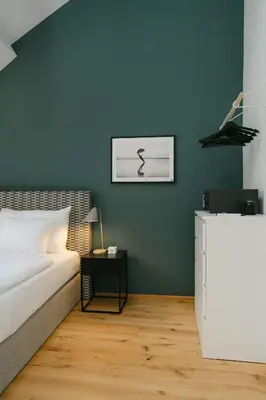 Ein Bett oder Betten in einem Zimmer der Unterkunft Modern 3BR perfect for 4-6 metro close to Naschmarkt