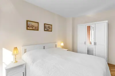 Ein Bett oder Betten in einem Zimmer der Unterkunft Apartment near Schloss Schönbrunn parking free