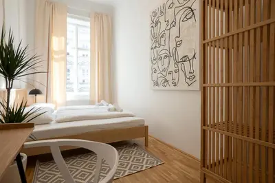 Ein Bett oder Betten in einem Zimmer der Unterkunft Posh 107 m2 3BR flat in the city center of Vienna