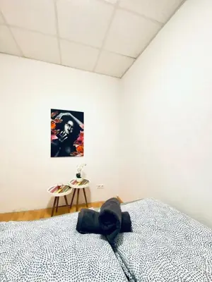 Ein Bett oder Betten in einem Zimmer der Unterkunft Comfortable Private Rooms in a Quiet, Well-Connected Area