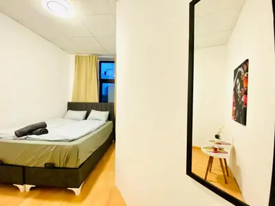 Ein Bett oder Betten in einem Zimmer der Unterkunft Comfortable Private Rooms in a Quiet, Well-Connected Area