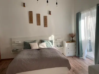 Ein Bett oder Betten in einem Zimmer der Unterkunft Ferienwohnung Wulkatal