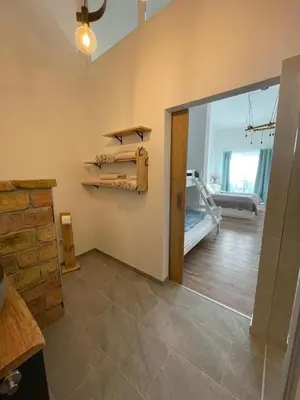 Ein Bett oder Betten in einem Zimmer der Unterkunft Ferienwohnung Wulkatal