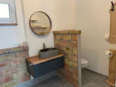 Ein Badezimmer in der Unterkunft Ferienwohnung Wulkatal