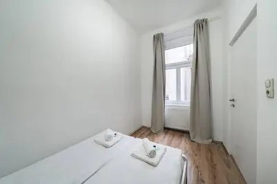 Ein Bett oder Betten in einem Zimmer der Unterkunft Sonniges Apartment in Top-Lage