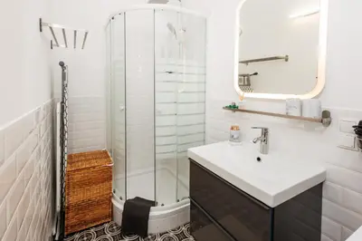 Ein Badezimmer in der Unterkunft Roman style apartment near city centre