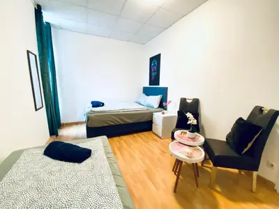 Ein Bett oder Betten in einem Zimmer der Unterkunft Simple Private Rooms in 3-Bedroom Apartment Near Train Station