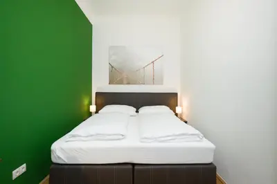 Ein Bett oder Betten in einem Zimmer der Unterkunft Vienna Stay Apartments Castellez 1020