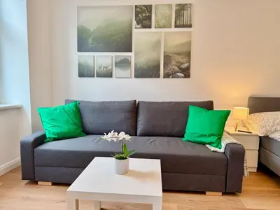 Ein Sitzbereich in der Unterkunft Modern Renovated Apartment