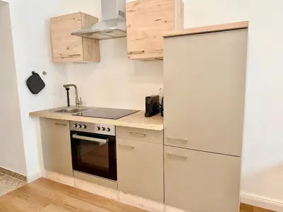 Küche/Küchenzeile in der Unterkunft Modern Renovated Apartment