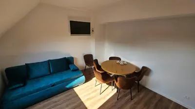 Ein Sitzbereich in der Unterkunft bookVienna Apartments