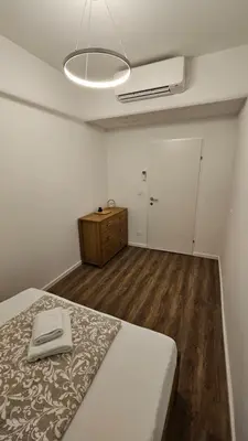 Ein Bett oder Betten in einem Zimmer der Unterkunft bookVienna Apartments