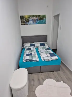 Ein Bett oder Betten in einem Zimmer der Unterkunft Silver Appartement