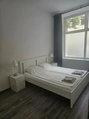 Ein Bett oder Betten in einem Zimmer der Unterkunft Prater Apartments