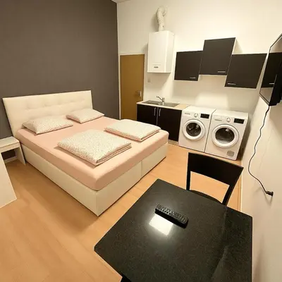 Ein Bett oder Betten in einem Zimmer der Unterkunft UrbanStay 2