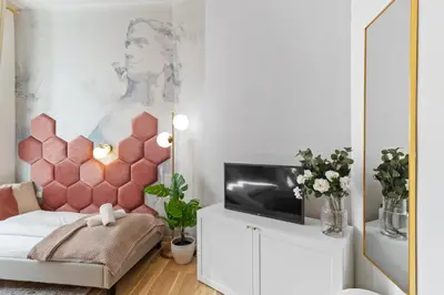 Ein Bett oder Betten in einem Zimmer der Unterkunft Elegant Room Near Prater & City Center