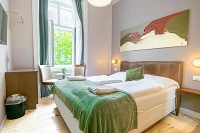 Ein Bett oder Betten in einem Zimmer der Unterkunft 1 Apt & 5 Aparthotels for Groups by Mariahilfer