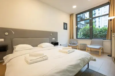 Ein Bett oder Betten in einem Zimmer der Unterkunft Comfort Studio with Queen-Size Bed, Self Check-in K1