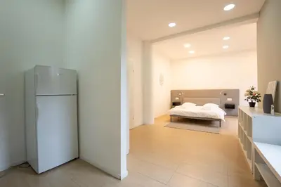 Ein Bett oder Betten in einem Zimmer der Unterkunft Comfort Studio with Queen-Size Bed, Self Check-in K1