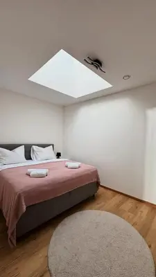 Ein Bett oder Betten in einem Zimmer der Unterkunft Apartment Andi Parndorf