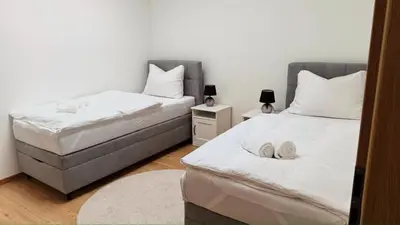 Ein Bett oder Betten in einem Zimmer der Unterkunft Apartment Andi Parndorf