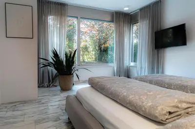 Ein Bett oder Betten in einem Zimmer der Unterkunft Chez Christine