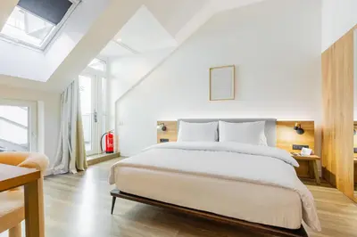Ein Bett oder Betten in einem Zimmer der Unterkunft FortyPlusOne Hotel Vienna