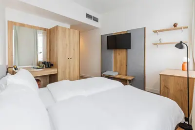 Ein Bett oder Betten in einem Zimmer der Unterkunft FortyPlusOne Hotel Vienna