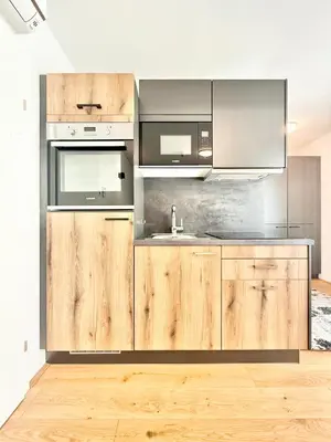 Küche/Küchenzeile in der Unterkunft Möbliertes Apartment