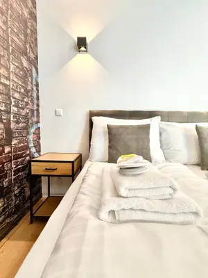 Ein Bett oder Betten in einem Zimmer der Unterkunft Möbliertes Apartment