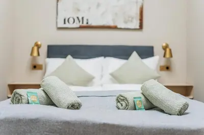 Ein Bett oder Betten in einem Zimmer der Unterkunft District One - Hideaway Hostel