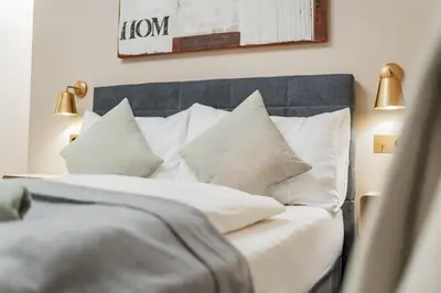 Ein Bett oder Betten in einem Zimmer der Unterkunft District One - Hideaway Hostel