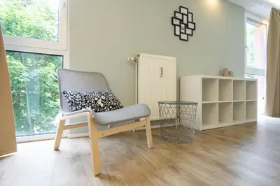 Ein Sitzbereich in der Unterkunft Modern Studio with Queen-Size Bed, Self Check-in K7