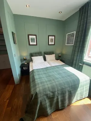 Ein Bett oder Betten in einem Zimmer der Unterkunft Vienna 1st District with Balcony and AirCon