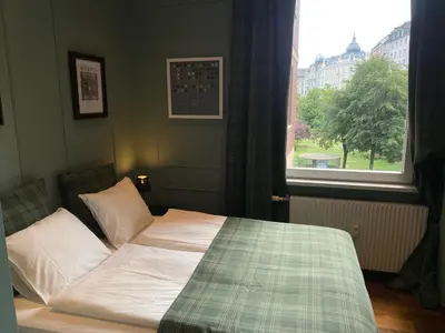 Ein Bett oder Betten in einem Zimmer der Unterkunft Vienna 1st District with Balcony and AirCon