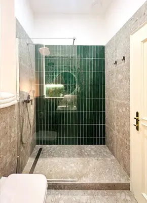 Ein Badezimmer in der Unterkunft Villa Romana Apartments