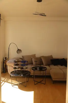 Ein Sitzbereich in der Unterkunft City Central Suite