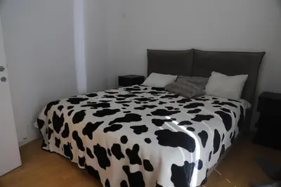 Ein Bett oder Betten in einem Zimmer der Unterkunft City Central Suite