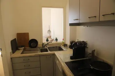 Küche/Küchenzeile in der Unterkunft City Central Suite