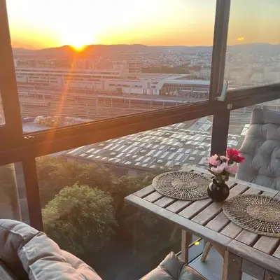 High-rise apartment with sunset