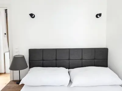 Ein Bett oder Betten in einem Zimmer der Unterkunft Urban Retreat Vienna