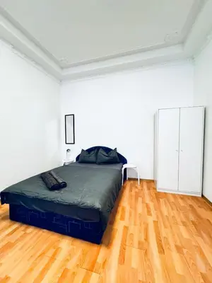 Ein Bett oder Betten in einem Zimmer der Unterkunft Modern 1-Bedroom Apartment for 3, 15 Minutes from Augarten