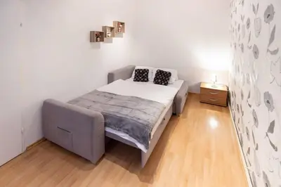 Ein Bett oder Betten in einem Zimmer der Unterkunft Premium Deluxe Zentrum nähe