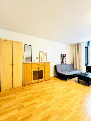 Ein Sitzbereich in der Unterkunft Cozy 1BR Apartment, 15 Min from Augarten