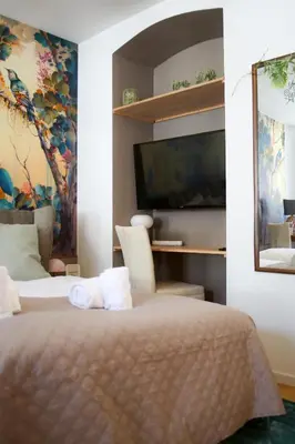 Ein Bett oder Betten in einem Zimmer der Unterkunft Cozy Stylish Apartment