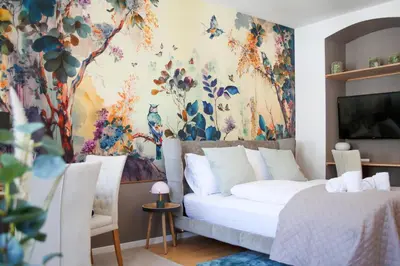 Ein Bett oder Betten in einem Zimmer der Unterkunft Cozy Stylish Apartment