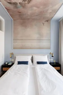 Ein Bett oder Betten in einem Zimmer der Unterkunft Urban Hideaway Vienna