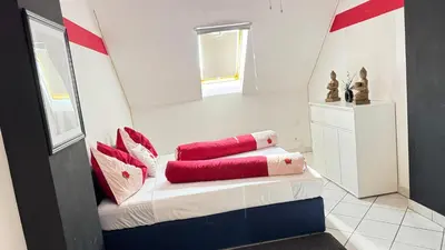 Ein Bett oder Betten in einem Zimmer der Unterkunft Stundenzimmer-sollenau - Mini Motel