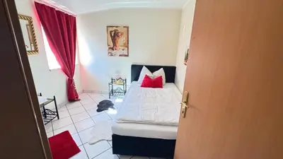 Ein Bett oder Betten in einem Zimmer der Unterkunft Stundenzimmer-sollenau - Mini Motel